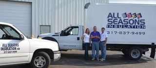 VanSlyke family standing in front of business truck